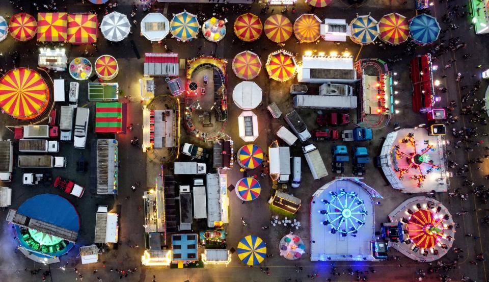 People attend Hull Fair, which is one of the largest travelling fairs across Europe, in Hull, Britain, October 7, 2022. REUTERS/Lee Smith