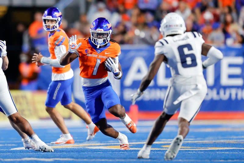 Boise State running back Jambres Dubar (1) runs with the ball against Utah State in the second half of an NCAA college football game, Saturday, Oct. 5, 2024, in Boise, Idaho. Boise State won 62-30. (AP Photo/Steve Conner) | Steve Conner