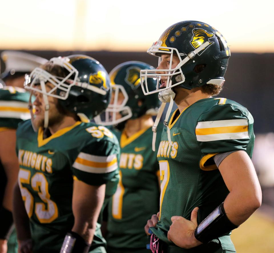 Northeastern senior Carson Terrell watches from the sideline during a sectional game against Heritage Christian Oct. 21, 2022.