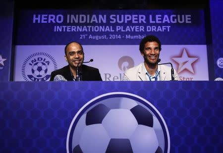 Kerala Blasters' marquee player David James (R) and general manager Viren D'Silva attend a news conference during the international player draft for the Indian Super League in Mumbai August 21, 2014. REUTERS/Danish Siddiqui/Files