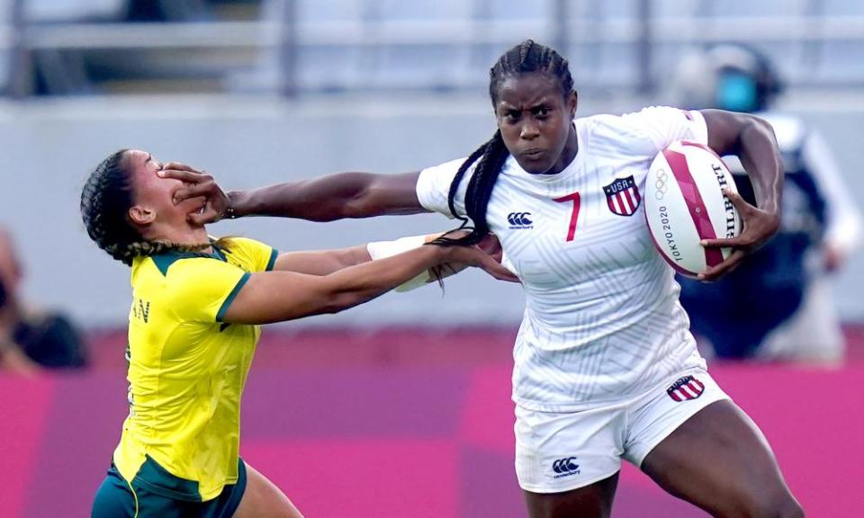 Naya Tapper (right) brushes off Australia’s Faith Nathan during the rugby sevens fifth-place play-off.