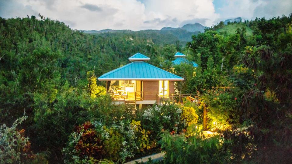 Evening view of a guest villa at Secret Bay, voted one of the best resorts in the Caribbean