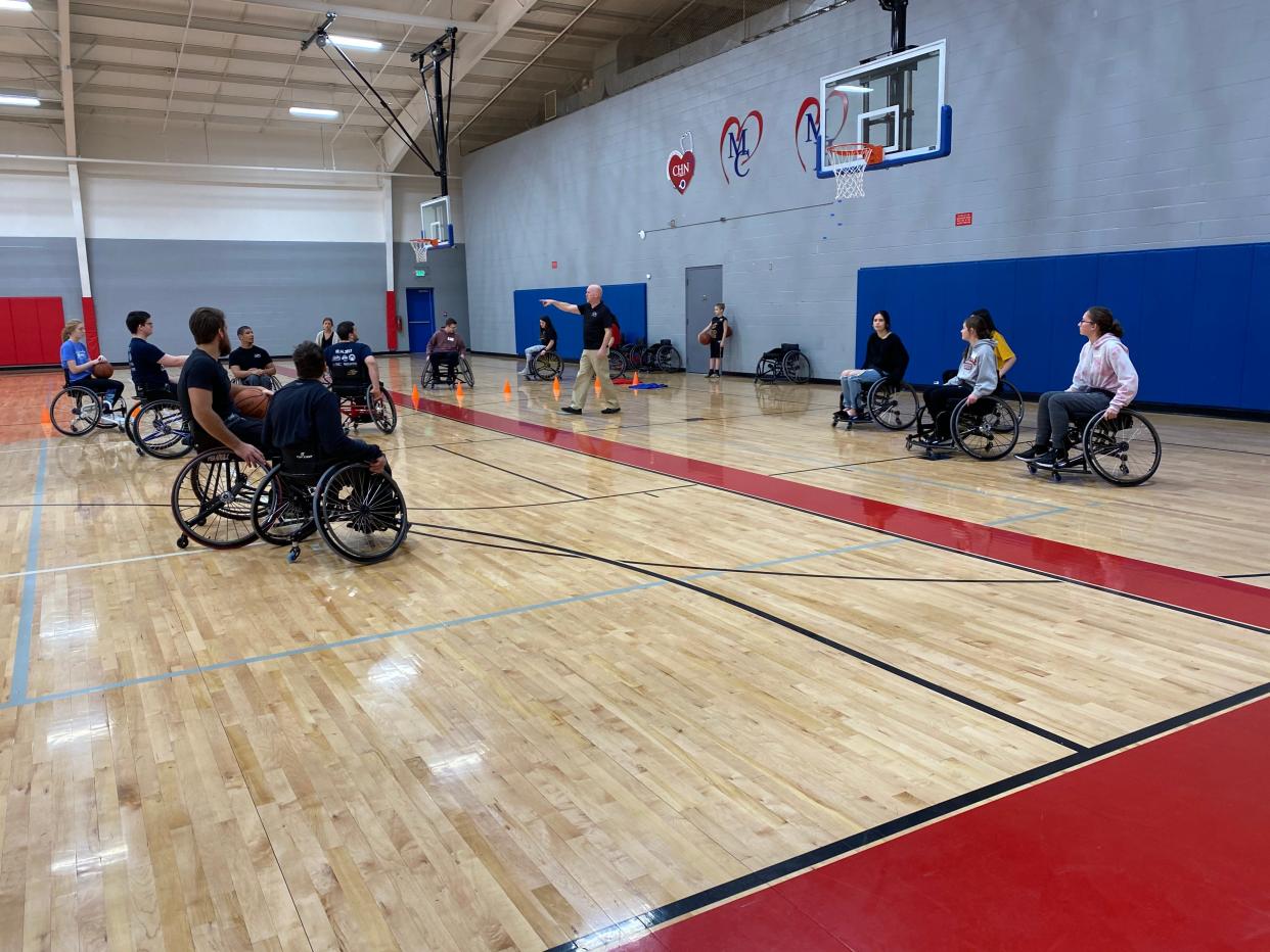 Students meet with members of the Adaptive Sports program in the spring of 2020. Casey's Challenge 5K fundraiser will be held at 7:30 a.m. Saturday, Aug. 13, at Western Reserve Insurance Group, 2865 Benden Drive, Wooster.