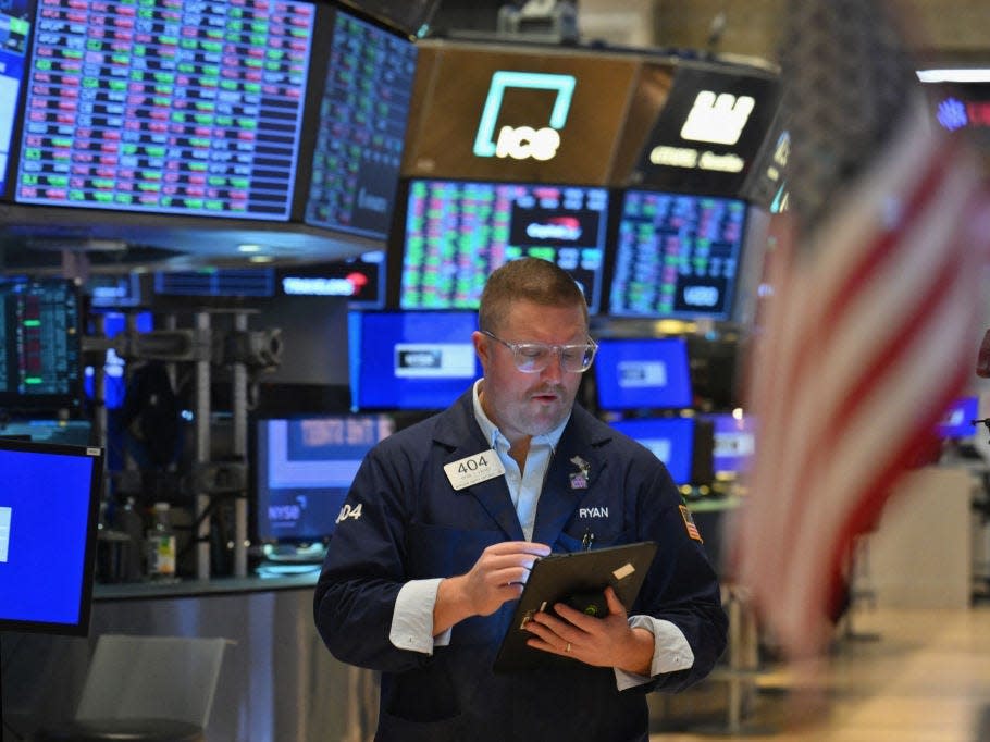 A trader works on the floor of the New York Stock Exchange (NYSE) during morning trading on March 4, 2024 in New York City.
