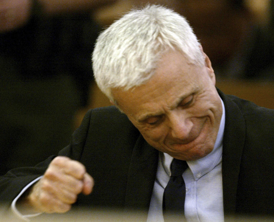 FILE - Robert Blake reacts after hearing the verdicts read in his murder trial for the death of his wife Bonny Lee Bakley in Los Angeles, March 16, 2005. Blake, the Emmy award-winning performer who went from acclaim for his acting to notoriety when he was tried and acquitted of murdering his wife, died Thursday, March 9, 2023, at age 89. (AP Photo/Nick Ut, File)