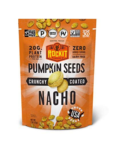 <p><strong>RockIt Snacks</strong></p><p>amazon.com</p><p><strong>$29.94</strong></p><p><a href="https://www.amazon.com/dp/B07RT1B6C9?tag=syn-yahoo-20&ascsubtag=%5Bartid%7C2140.g.35902212%5Bsrc%7Cyahoo-us" rel="nofollow noopener" target="_blank" data-ylk="slk:Shop Now" class="link ">Shop Now</a></p><p>Sure, you can grab a regular ol' pack of pumpkin seeds, but have some of these instead to upgrade your snack time. These pumpkin seeds are seasoned with a blend of roasted dried tomato, mild chili, garlic, and a zip of lime, and they won't throw you off of your Whole30 journey. They're also made with only plant-based ingredients, but they're packed with protein.</p>