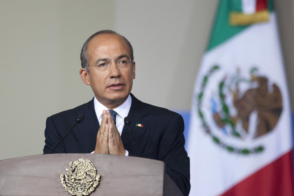 Mexico's President Felipe Calderon delivers his state-of-the-nation address to Congress in Mexico City, Monday, Sept. 3, 2012. Calderon delivered his final state-of-the-nation speech on Monday, trying to cement his legacy as the president who stabilized the economy and took on the country's entrenched organized crime groups, putting Mexico on the road to rule of law. (AP Photo/Alexandre Meneghini)