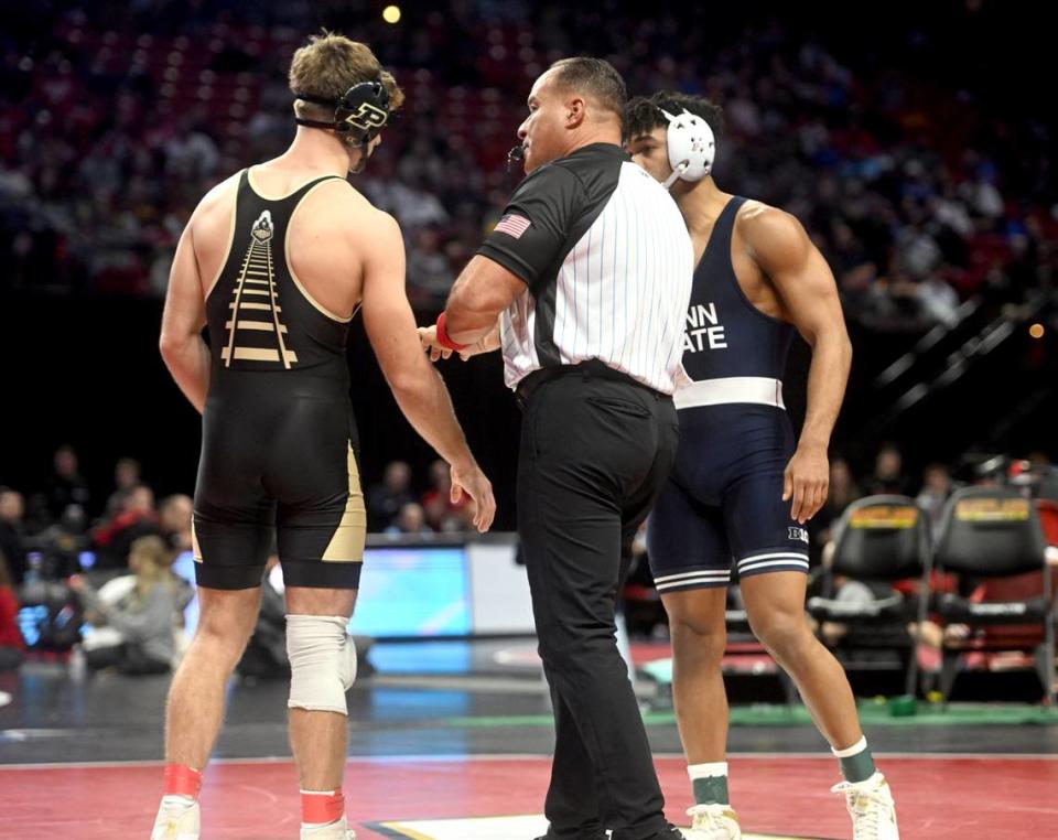 Penn State’s Carter Starocci injury-defaultes his bout against Purdue’s Brody Baumann at the Big Ten Wresting Championships at the Xfinity Center at the University of Maryland on Saturday, March 9, 2024. Starocci injury-defaulted the bout.