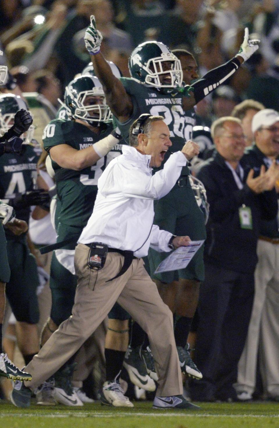 Michigan coach Mark Dantonio reacts to a turnover by Stanford during the second half of the Rose Bowl NCAA college football game Wednesday, Jan. 1, 2014, in Pasadena, Calif. Michigan State won 24-20. (AP Photo/Mark J. Terrill)