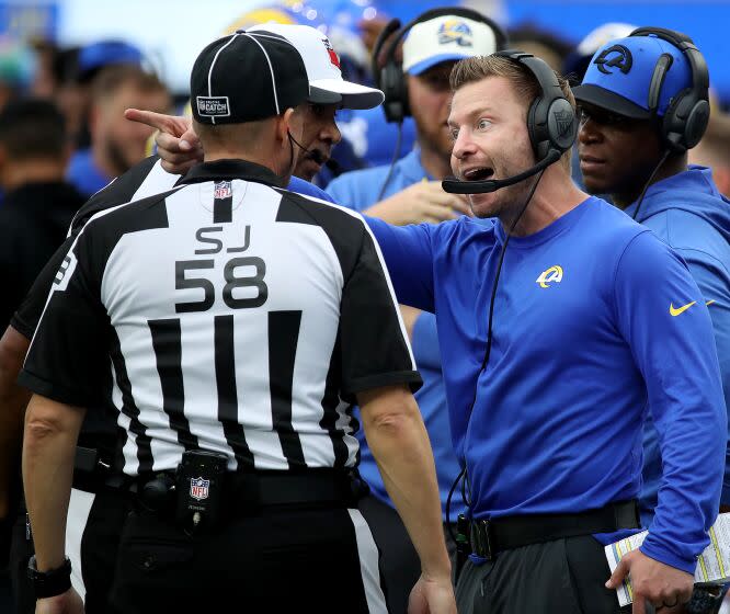 INGLEWOOD, CALIF. - OCT. 16, 2022. Rams head coach Sean McVay talks with an official in the third quarter.