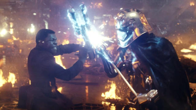 John Boyega and Gwendoline Christie fight to the death in 'Star Wars: The Last Jedi'. (Credit: Disney)
