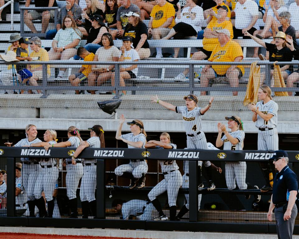 Missouri softball players react to a play during an NCAA Columbia Regional game against Omaha on Friday at Mizzou Softball Stadium.