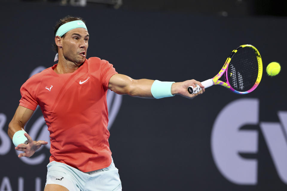 Rafael Nadal of Spain plays a shot in his match against Jason Kubler of Australia during the Brisbane International tennis tournament in Brisbane, Australia, Thursday, Jan. 4, 2024. (AP Photo/Tertius Pickard)