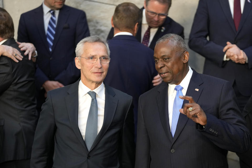 United States Secretary of Defense Lloyd Austin, right, speaks with NATO Secretary General Jens Stoltenberg during a group photo of NATO defense ministers at NATO headquarters in Brussels, Friday, June 14, 2024. (AP Photo/Virginia Mayo)