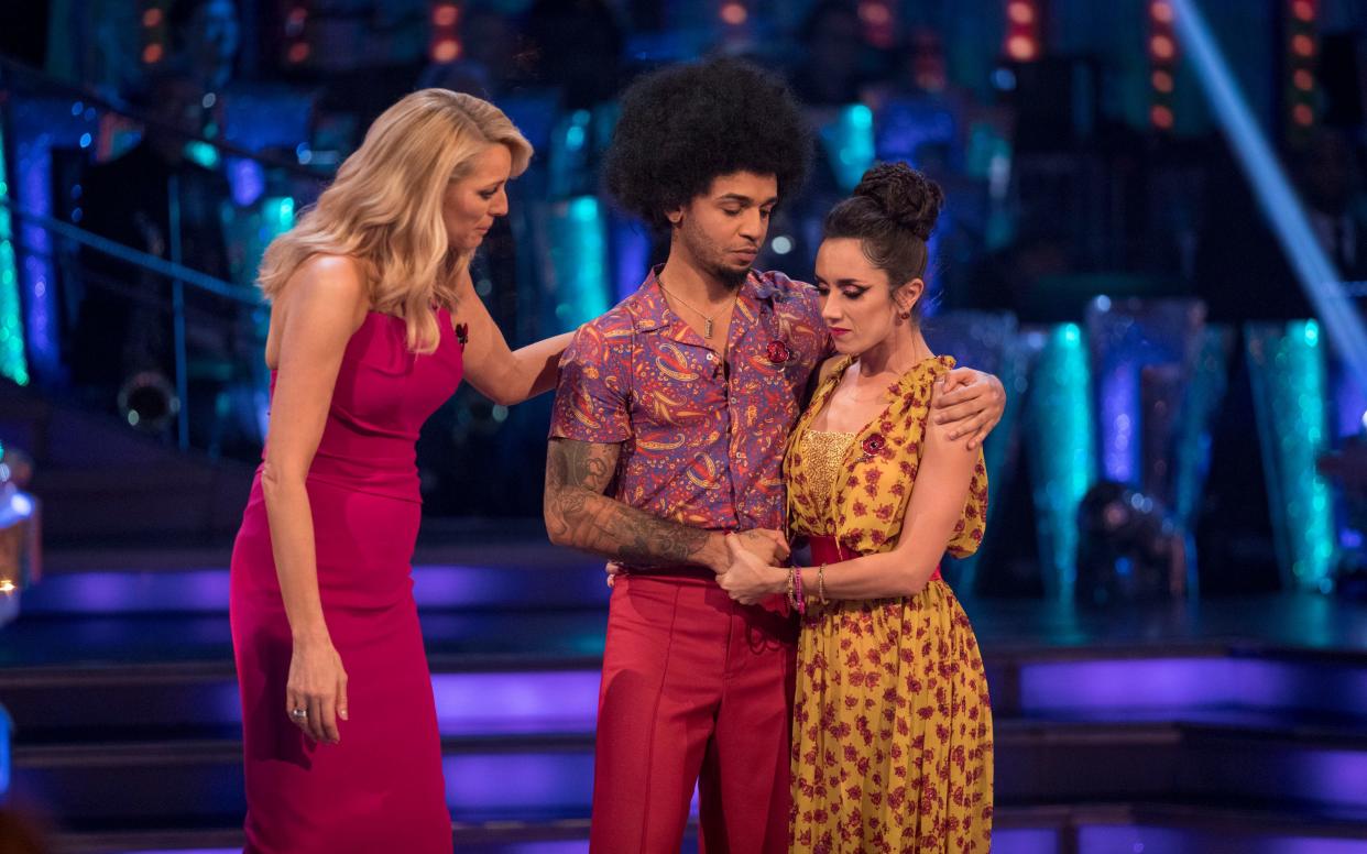 Devastated: Aston comforts his dance partner Janette after their shock elimination - WARNING: Use of this copyright image is subject to the terms of use of BBC Pictures' Digital Picture Service (BBC Pictures) as set out at www.bbcpictures.co.uk. In particular, this image may only be published by a registered User of BBC Pictures for editorial use for the purpose of publicising the relevant BBC programme, personnel or activity during the Publicity Period which ends three review weeks following the date of transmission and provided the BBC and the copyright holder in the caption are credited. For any other purpose whatsoever, including advertising and commercial, prior written approval from the copyright holder will be required.