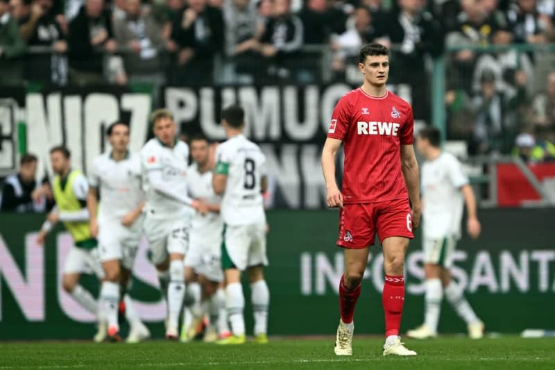Cologne's Eric Martel reacts during the German Bundesliga Soccer match between Borussia Moenchengladbach and 1. FC Colone at the Borussia-Park. Federico Gambarini/dpa