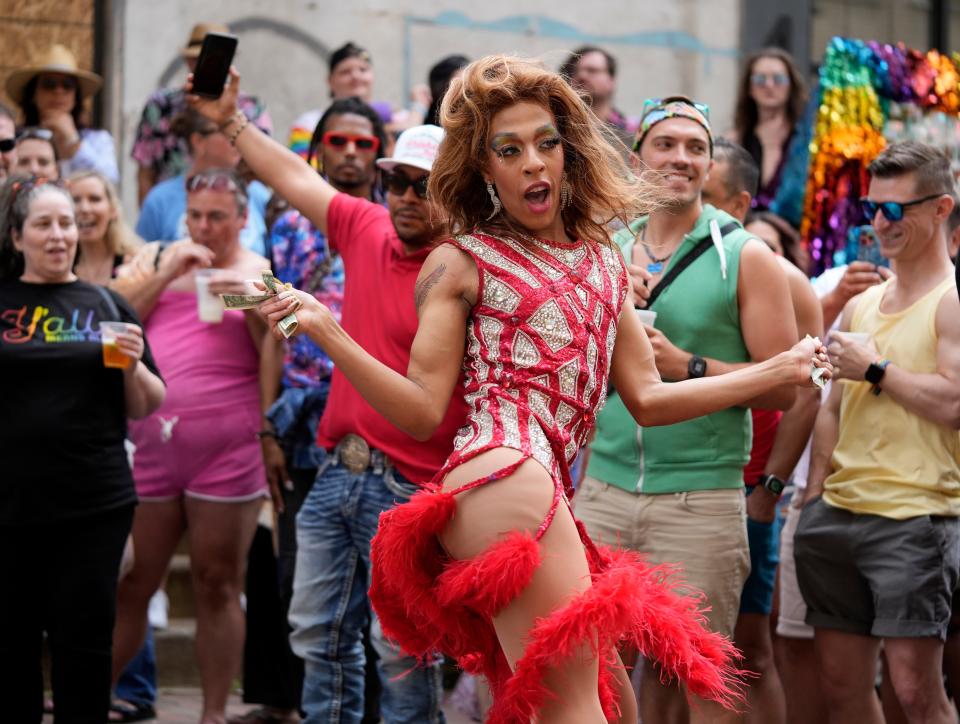 Drag queen Godiva performs during the Downtown Pride festival in Pearl Alley June 8 in Columbus.