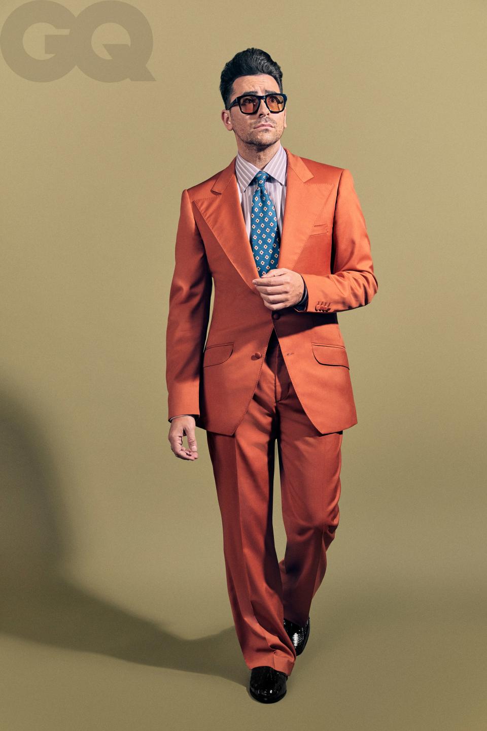 <cite class="credit">Suit, $1,950, by David Hart / Shirt, $750, by Brioni / Tie, $225, by Isaia / Shoes, $90, by Stacy Adams / Sunglasses, his own, by Gucci </cite>