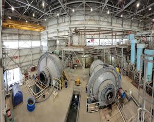 Interior of mill building showing SAG (left) and Ball (right) mills installed