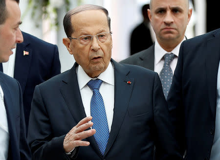 FILE PHOTO: Lebanese President Michel Aoun gestures on arrival at Tunis-Carthage International Airport to attend an Arab League summit in Tunis, Tunisia, March 30, 2019. Hussein Malla/Pool via REUTERS/File Photo