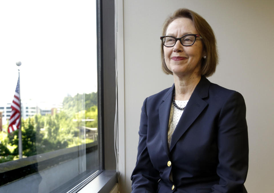 FILE - Oregon Attorney General Ellen Rosenblum poses for a photo at her office in Portland, Ore., July 13, 2016. Criminal charges are not warranted in the rare liquor probe that shook Oregon's alcohol agency last year and forced its executive director to resign, state justice officials said Monday, May 13, 2024. The findings were announced in a news release from Rosenblum. (AP Photo/Don Ryan, File)