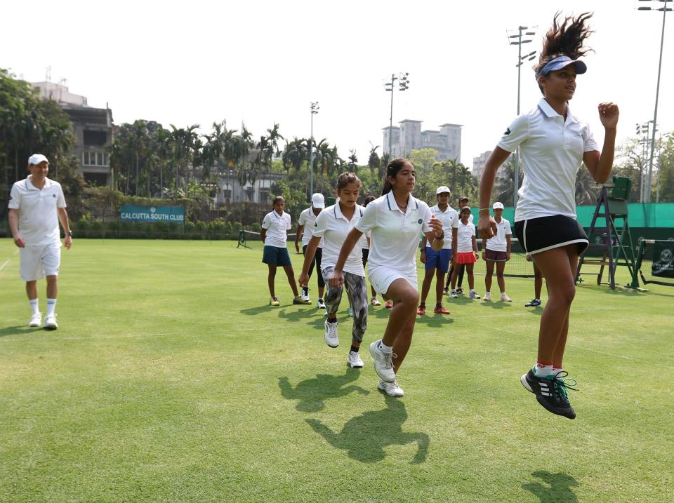 The girls warming up for the tournament (AELTC)Getty