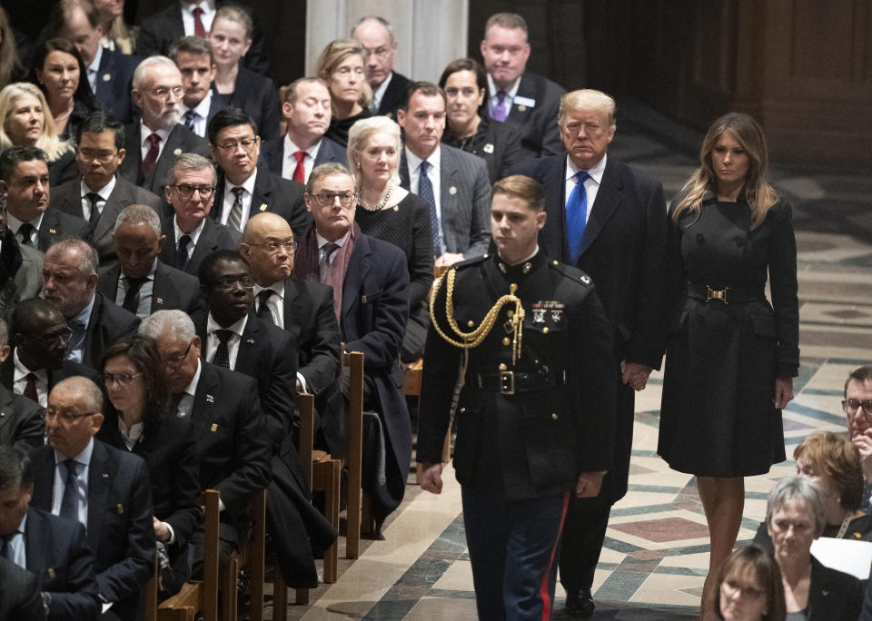 President Donald Trump and first lady Melania Trump arrive for the State Funeral for former President George H.W. Bush at the Washington National Cathedral in Washington, Wednesday, Dec. 5, 2018. (Photo: Carolyn Kaster/AP)