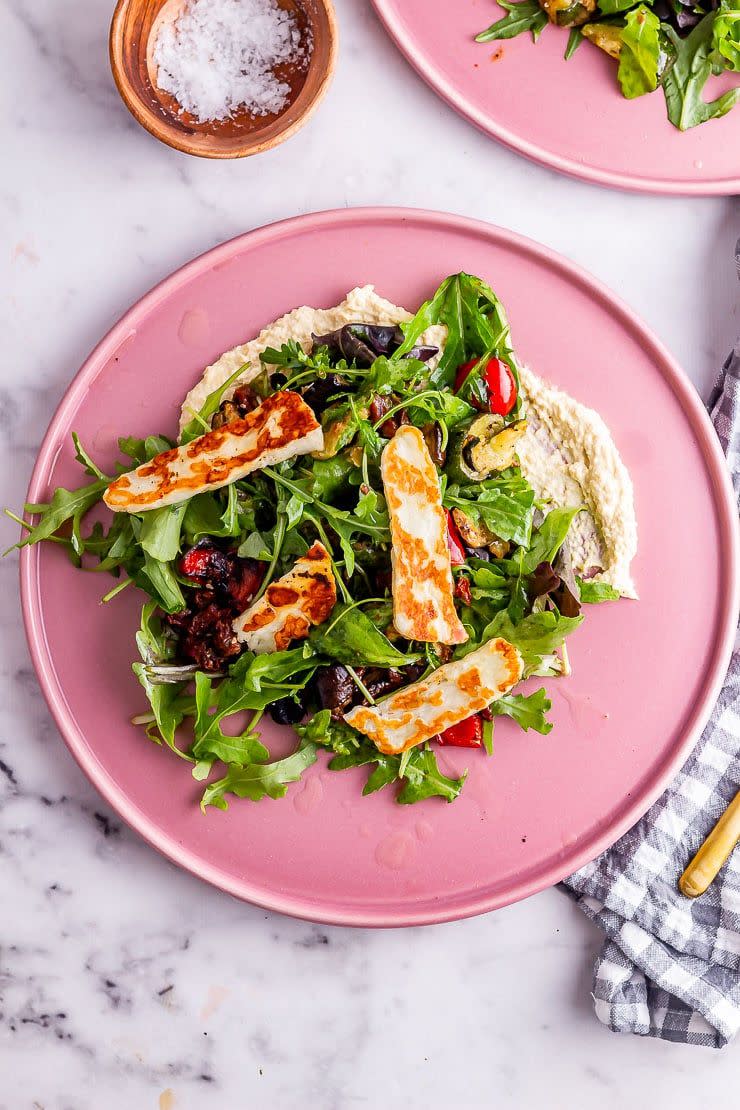 <p>Fancy a healthy mix of fresh greens and chopped Mediterranean veggies marinated in a mixture of olive oil and lemon juice all served on a bed of hummus? Yes you do. </p><p>Get the <a href="https://thecookreport.co.uk/roast-vegetable-salad/" rel="nofollow noopener" target="_blank" data-ylk="slk:Roast Vegetable Salad with Halloumi;elm:context_link;itc:0;sec:content-canvas" class="link ">Roast Vegetable Salad with Halloumi</a> recipe.</p><p>Recipe from <a href="https://thecookreport.co.uk/" rel="nofollow noopener" target="_blank" data-ylk="slk:The Cook Report;elm:context_link;itc:0;sec:content-canvas" class="link ">The Cook Report</a>.</p>