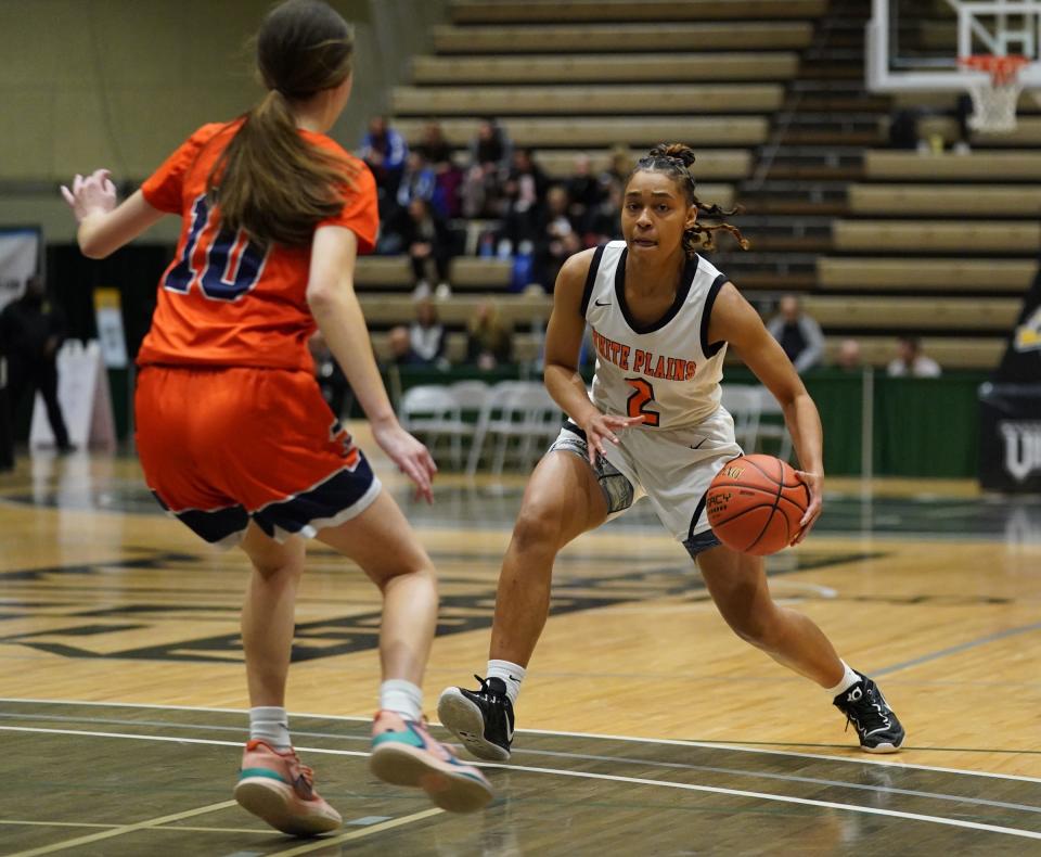 White Plains's Rider-bound senior Aliya McIver, shown here in action during the Tigers' 57-46 win over Liverpool in the girls Class AA state semifinal March 17, 2023 at Hudson Valley Community College in Troy, thought her high school career was over the following night with a loss to Webster Schroeder. But McIver and her teammates will play at least one more game, competing in the state Federation tournament.