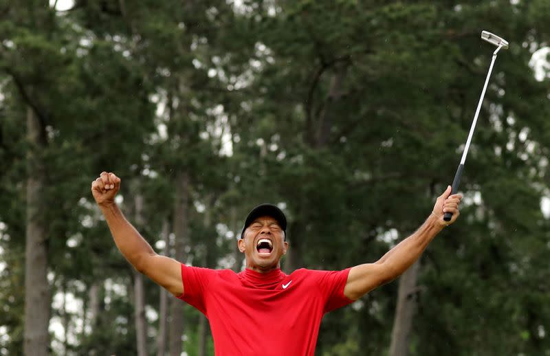 FILE PHOTO: Tiger woods celebrates after winning the 2019 Masters