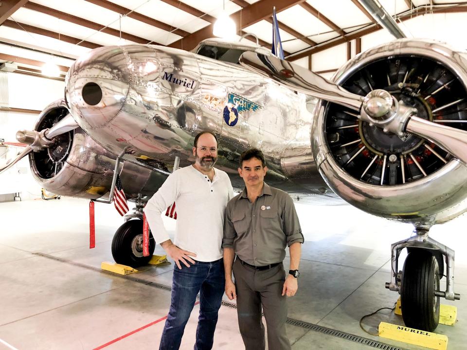 Scott Philbrook, left, and Forrest Burgess, co-hosts of "Astonishing Legends," are shown in Kansas with Muriel, a replica of Amelia Earhart's lost Electra 10-E airplane.
Photo courtesy Astonishing Legends