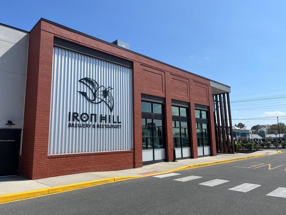 Iron Hill Brewing's outpost at the Tanger Outlets in Rehoboth Beach. Since its founding in 1996 in Newark, Delaware, Iron Hill has opened more than 20 locations in the mid-Atlantic and South.