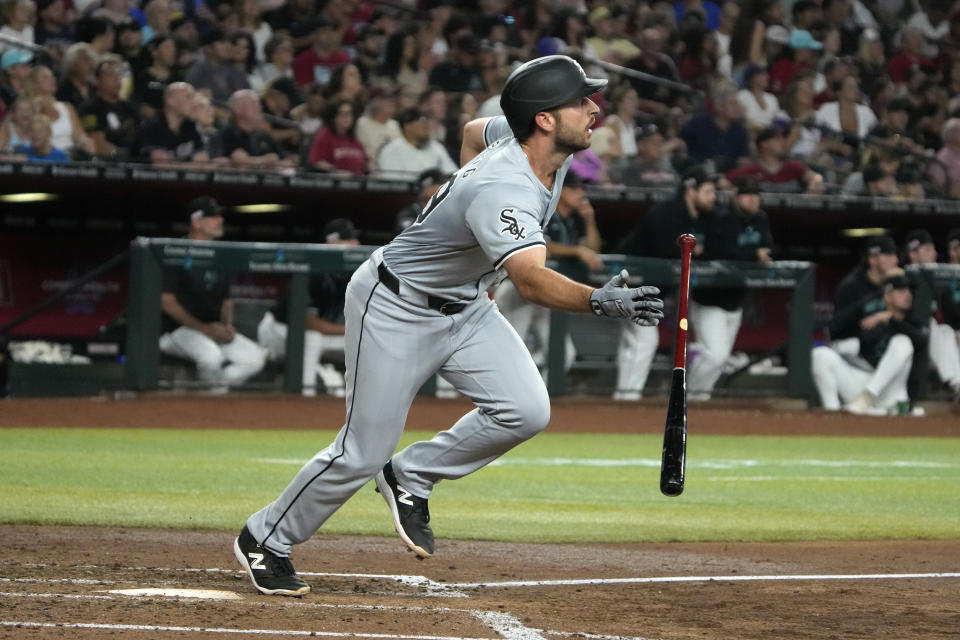 Chicago White Sox' Paul DeJong watches his solo home run against the Arizona Diamondbacks during the fourth inning of a baseball game Saturday, June 15, 2024, in Phoenix. (AP Photo/Rick Scuteri)