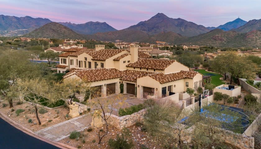 The 1.1-acre estate includes a 10,000-square-foot home with a batting cage, basketball court and rock climbing wall.