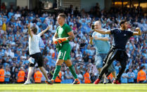 <p>Soccer Football – Premier League – Manchester City vs Huddersfield Town – Etihad Stadium, Manchester, Britain – May 6, 2018 Manchester City fans celebrate winning the premier league on the pitch with Ederson at the end of the match Action Images via Reuters/Carl Recine EDITORIAL USE ONLY. No use with unauthorized audio, video, data, fixture lists, club/league logos or “live” services. Online in-match use limited to 75 images, no video emulation. No use in betting, games or single club/league/player publications. Please contact your account representative for further details. </p>