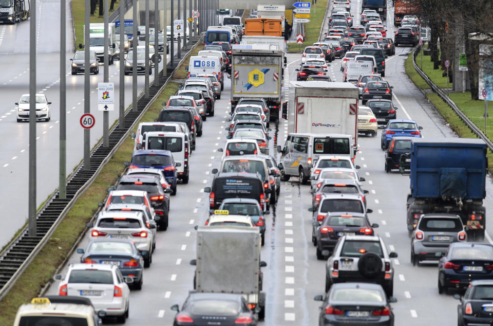 Cars queue on a street in Munich, southern Germany, Monday, Dec. 10, 2018. A German-wide strike of the train workers forced thousands of commuters to take their cars instead of public transport. (Matthias Balk/dpa via AP)