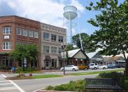 <p>Senoia is famous for being a filming location for <em>The Walking Dead</em>, with plenty of tours catering to fans. (There's also <a href="http://nicandnormans.com/" rel="nofollow noopener" target="_blank" data-ylk="slk:Nic & Norman's;elm:context_link;itc:0;sec:content-canvas" class="link ">Nic & Norman's</a>, a restaurant owned by <em>The Walking Dead</em> star Norman Reedus and director/producer Greg Nicotero.) But before that huge hit, residents have been attracted to this adorable town for its historic architecture and quaint shops. The town planned for "smart growth" without sacrificing character with the help of <a href="http://www.historicalconcepts.com/communities/towns-villages-hamlets/senoia-historic-district" rel="nofollow noopener" target="_blank" data-ylk="slk:Historical Concepts;elm:context_link;itc:0;sec:content-canvas" class="link ">Historical Concepts</a>.</p><p><a href="https://www.housebeautiful.com/lifestyle/g3345/historic-homes/" rel="nofollow noopener" target="_blank" data-ylk="slk:Peek inside 50 famous historic homes »;elm:context_link;itc:0;sec:content-canvas" class="link "><em>Peek inside 50 famous historic homes »</em></a></p>
