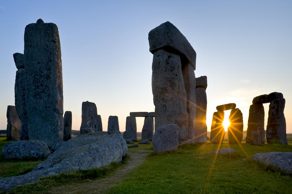 <p>The prehistoric monuments at Stonehenge, England, and nearby Avebury, are some of the earliest known man-made monuments. The 6,500-acre site offers walking tours and has volunteers on site to answer questions, as well as exhibits and replicas of neolithic homes. World Heritage site since 1986. (Photo: David Nunuk/All Canada Photos/Getty Images) </p>