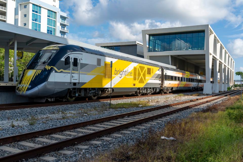 A Brightline train leaves the station in West Palm Beach, Florida on September 6, 2023.