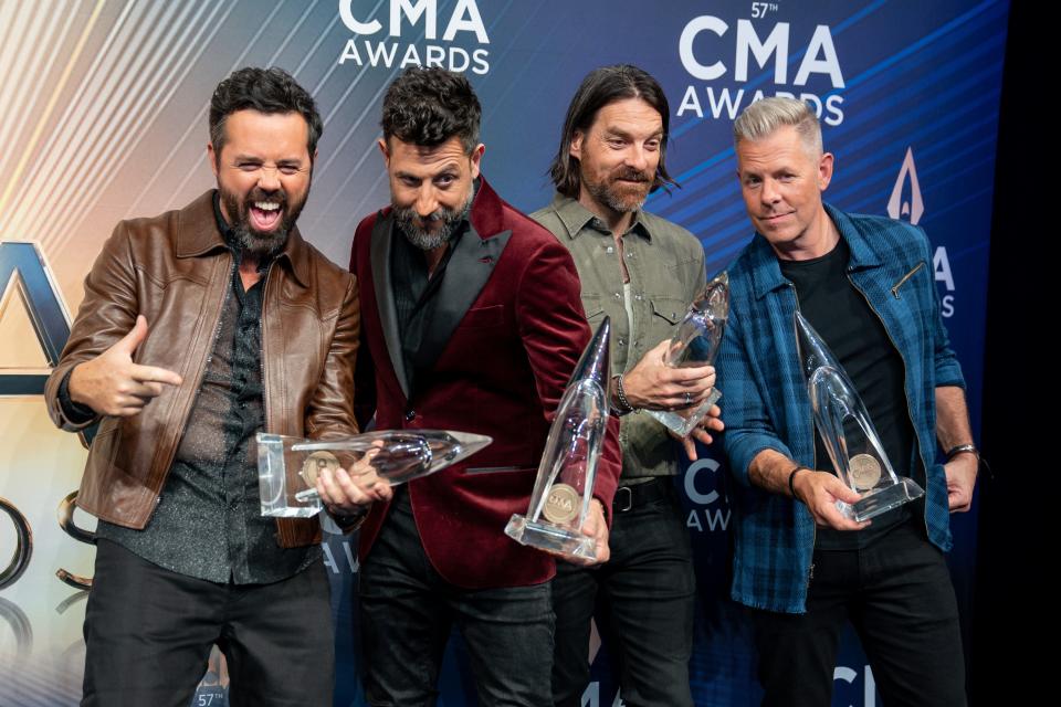 Old Dominion members celebrate with their Vocal Group of the Year awards.