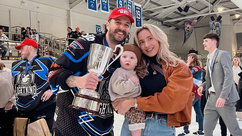 Liam with his wife Nicole and son Louis on ice