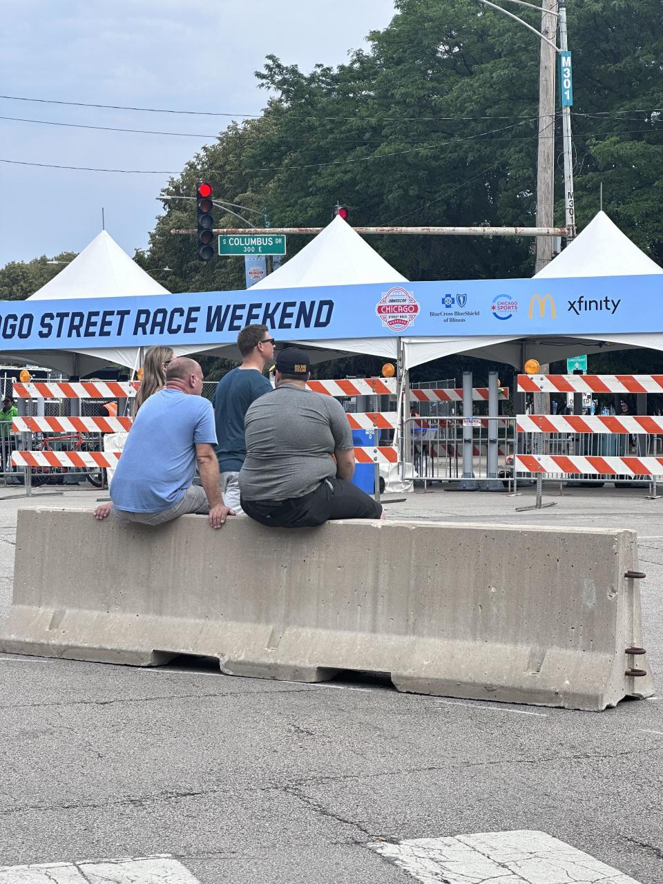 Fans like Daniel Blaufman from New Hampshire and Mike McGowan sit outside the gated entry, hoping to catch a glimpse of the preparations on Friday. / Credit: Analisa Novak/CBS News