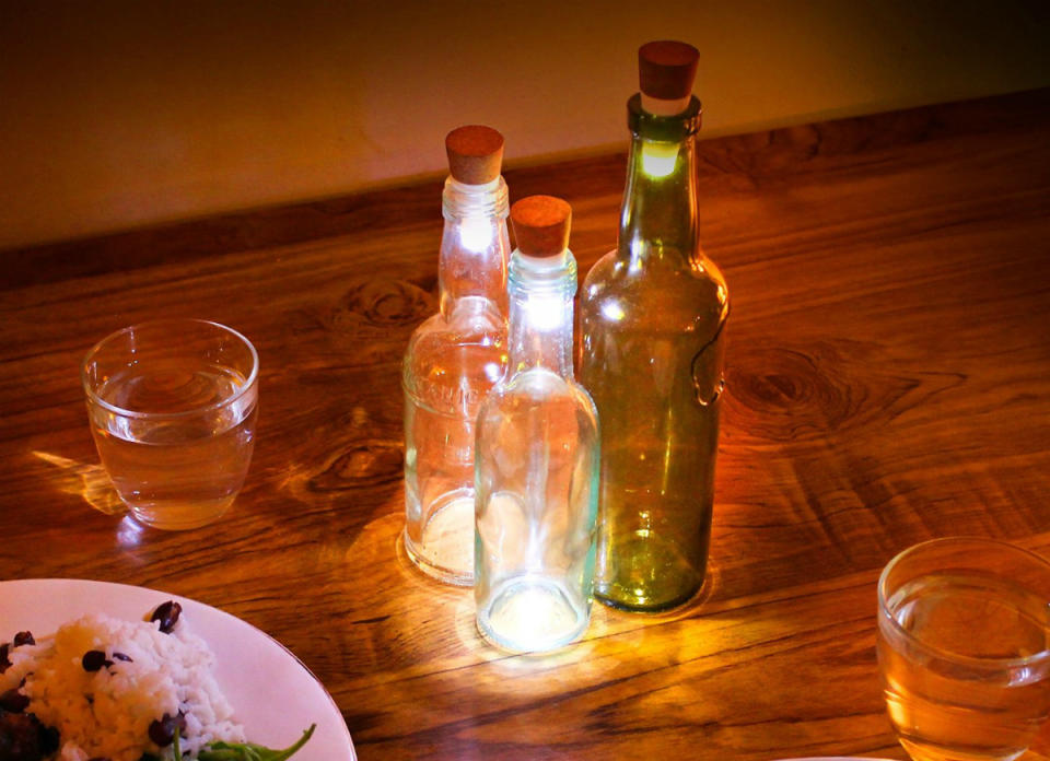 <body> <p>Patio lights and tiki torches can't hold a candle to these brilliant LED lights that turn any glass bottle—whether a decorative accent from HomeGoods or simply an empty wine bottle—into a stylish lamp for your next gathering. Just charge the <a rel="nofollow noopener" href=" http://amzn.to/1TFd4DG" target="_blank" data-ylk="slk:bottle-topper;elm:context_link;itc:0;sec:content-canvas" class="link ">bottle-topper</a> LED for an hour, plug it back into its cork base, twist to turn it on, then put it on your bottle to impart a magical glow to your evening. The light plugs into any USB port for charging, stays lit for up to three hours, and can be used indoors or out. <em>Available on <a rel="nofollow noopener" href=" http://amzn.to/1TFd4DG" target="_blank" data-ylk="slk:Amazon;elm:context_link;itc:0;sec:content-canvas" class="link ">Amazon</a>; $11.</em> </p> <p><strong>Related: <a rel="nofollow noopener" href=" http://www.bobvila.com/slideshow/8-new-ideas-for-diy-outdoor-lighting-48892/?bv=yahoo" target="_blank" data-ylk="slk:8 New Ideas for DIY Outdoor Lighting;elm:context_link;itc:0;sec:content-canvas" class="link ">8 New Ideas for DIY Outdoor Lighting</a> </strong> </p> </body>