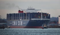 SOUTHAMPTON, ENGLAND - DECEMBER 10: The Marco Polo, the world's biggest container ship, leaves Southampton docks on December 10, 2012 in England. On its first visit to Europe, the 54m (177ft) wide and 396m (1299ft) long container ship - which is 51m (167ft) longer than the Queen Mary II - will mostly carry consumer goods for delivery to shops for Christmas. (Photo by Peter Macdiarmid/Getty Images)