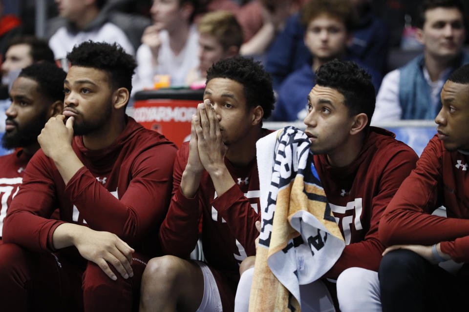 The Temple bench reacts during the second half of a First Four game of the NCAA college basketball tournament against Belmont, Tuesday, March 19, 2019, in Dayton, Ohio. (AP Photo/John Minchillo)