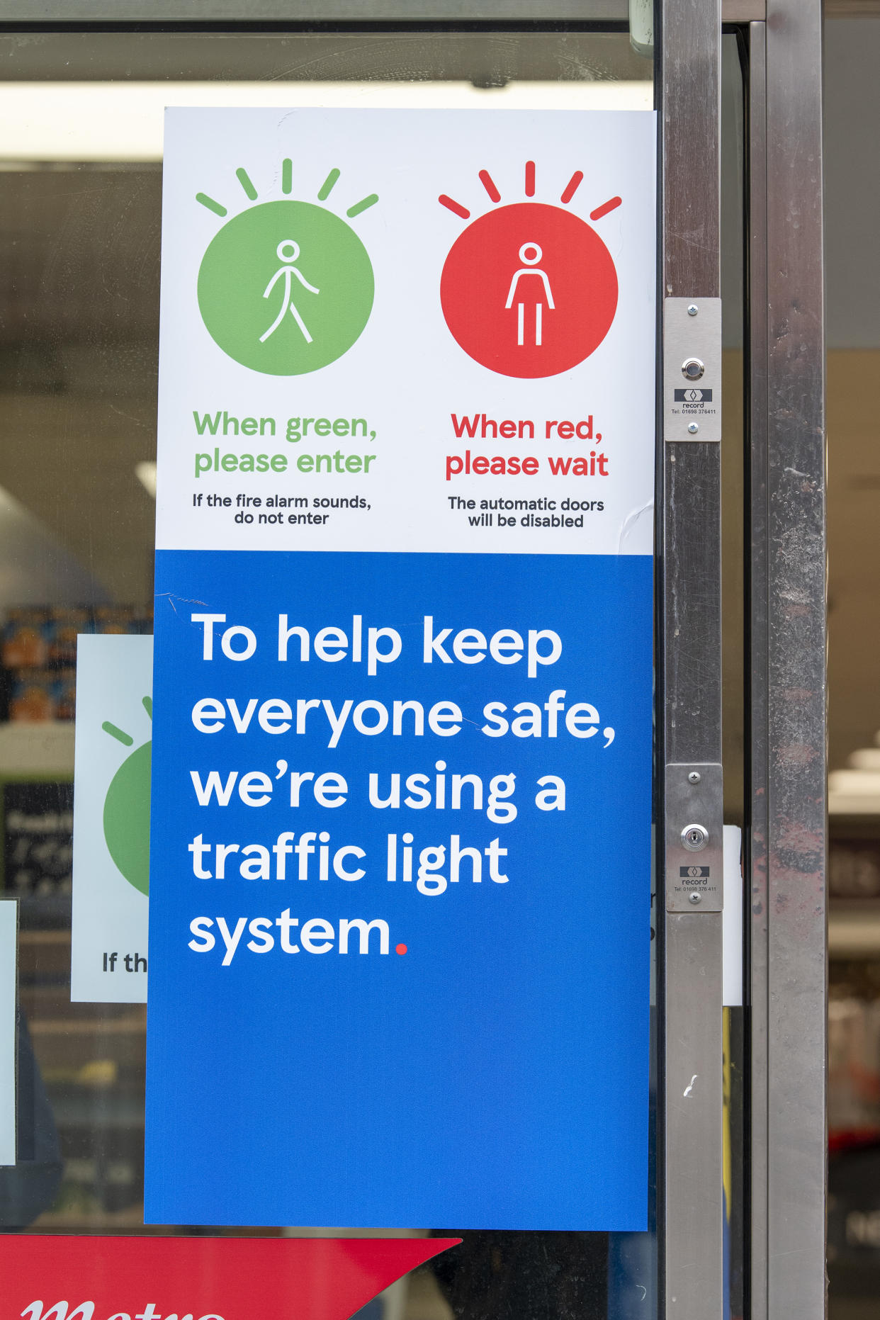 LONDON, UNITED KINGDOM - 2020/10/12: Signage seen at the Tesco metro supermarket in Dean Street, which has a traffic light system to let shoppers know when it is safe to enter the store so it can adhere to social distancing restrictions. (Photo by Dave Rushen/SOPA Images/LightRocket via Getty Images)