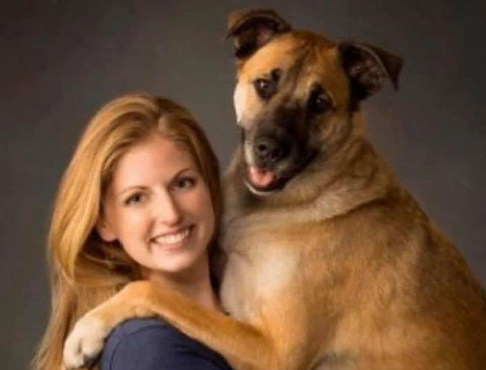 Katie Rogers pictured with Tanner the dog.