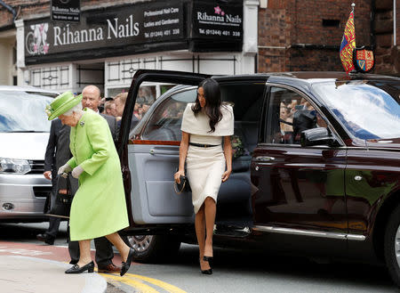 Britain's Queen Elizabeth and Meghan, the Duchess of Sussex, arrive at the Storyhouse during their visit to Chester, June 14, 2018. REUTERS/Phil Noble/Pool