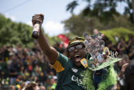 South Africa fans celebrate at the Pirates Rugby Club in Johannesburg, South Africa, after their team's victory in the Rugby World Cup final between South Africa and England being played in Tokyo, Japan on Saturday Nov. 2, 2019. South Africa defeated England 32-12. (AP Photo/Jerome Delay)