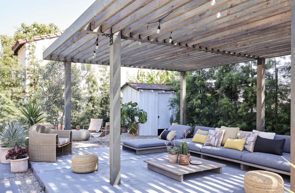 “Me and Raúl chose everything in here, and I love that,” Colman says. No stone was left unturned, no corner was left undecorated—from the RH sofa and coffee table to the Crate & Barrel poufs that finish off the swoon-worthy outdoor cabana.